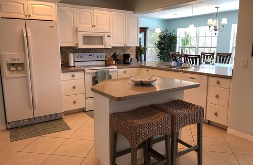 Fort Pierce Shores House | Waterfront Island Home with Dock, Pool and just steps to the Beach!