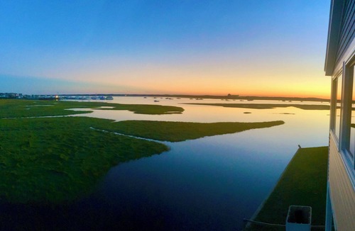 Hampton House | Waterfront - marsh side with EPIC views of Hampton Harbor and outside deck!