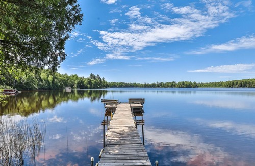 Presque Isle House | Waterfront suite on South Turtle Lake with communal dock, rowboats & firepit