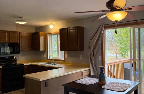 Moorhead Condo | Welcoming 2-bedroom condo w/Fenced yard on a park