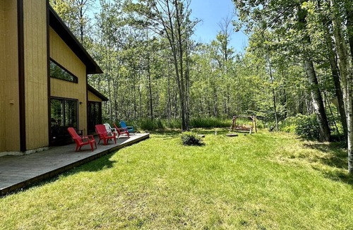 La Pointe House | Wilderness Retreat Cottage Tucked in the Woods