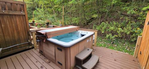 McHenry Villa | Wooded Wonder-2 Bedroom Ski-in and out with Hot Tub