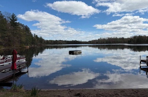 Lac du Flambeau Cabin | Your Little Bit O’ Heaven: Historic Lakefront Log Cabin, Sandy Beach & Stars