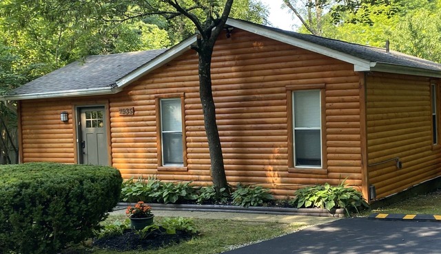 2 BR, 1-1/2 bath house in wooded setting with private back yard, deck, hot tub.