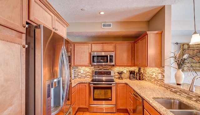 2BR/2BA LAKEFRONT CONDO 305 Private Beach/Balcony/indoor pool.