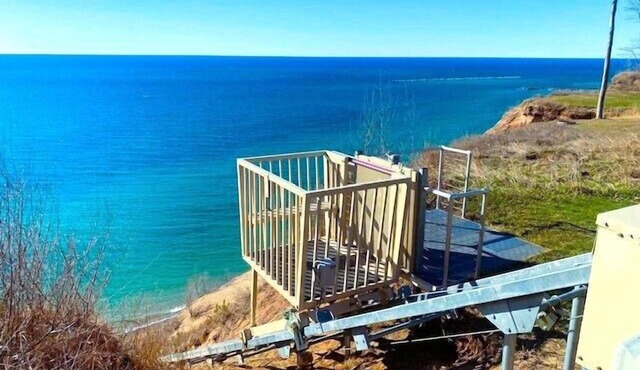 4 Bed, 3.5 Bath home on a High Bluff of Lake Michigan, electric lift to beach