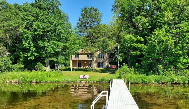 4 bedroom on Lac Courte Oreilles Lake with clear water and a sandy bottom!