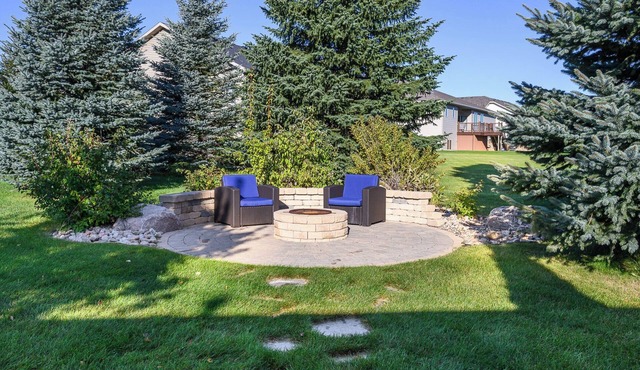 4-bedroom townhome in a quiet, upscale neighborhood with a private deck and yard