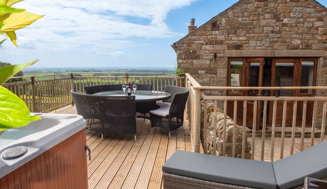 A cottage that sleeps 8 guests in 4 bedrooms