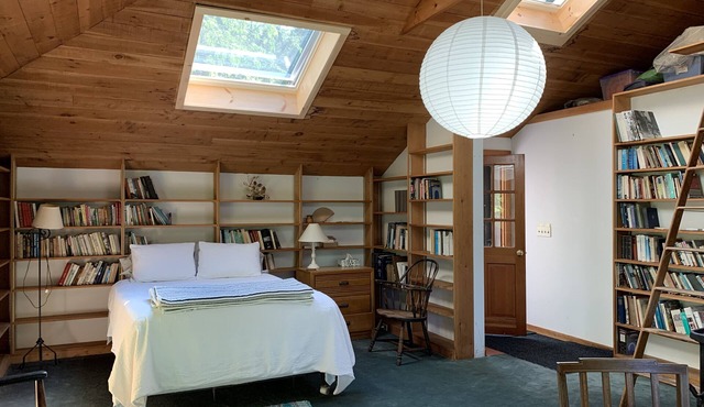 Airy, book-lined cottage on historic seaside estate with private beaches & more