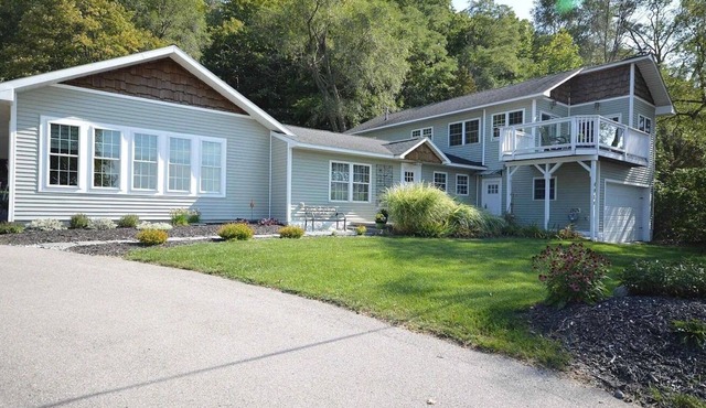 An exceptional Northern Michigan retreat designed for family on the Lake MI