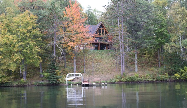 An Iconic Private Retreat on Beautiful Red Cedar Lake
