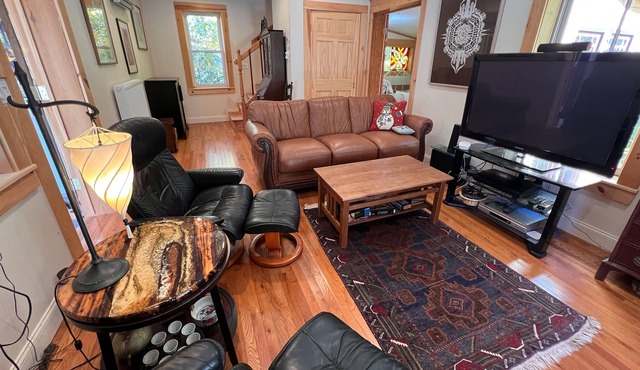 Artist-built home on 22 acres with ponds, woodlands, private hot tub, & firepit