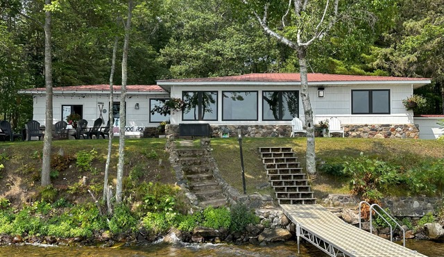 AVAILABLE – Lakefront Retreat: Dock, Designer Kitchen, & Sunrises to Remember.