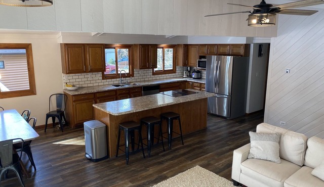 Beautiful home is located on a quiet full recreation lake outside of Wild Rose.