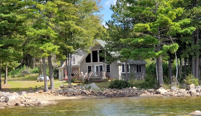 Beautiful Lakefront Home with Stunning Sunsets and Private Beach!