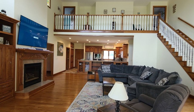 Beautiful Lake Front house with lake access, fireplace, patio and grill.