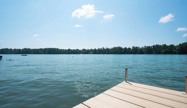 Beautiful Lake Home with large private frontage on crystal clear spring-fed lake