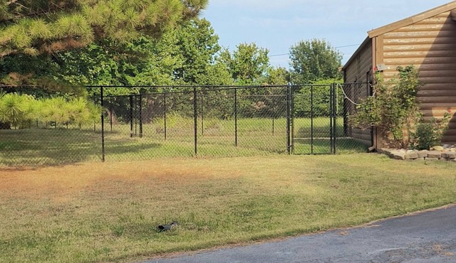 Beautiful lodge with hot tub nestled at the edge of the woods on gated property