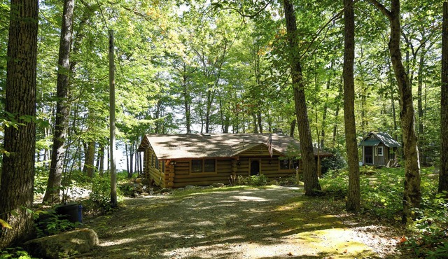 Beautiful open-concept log home in quiet setting on Thompson Lake.