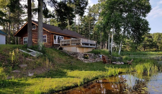 Beautiful, renovated cabin on Au Train RIver with Lake Superior across the road.
