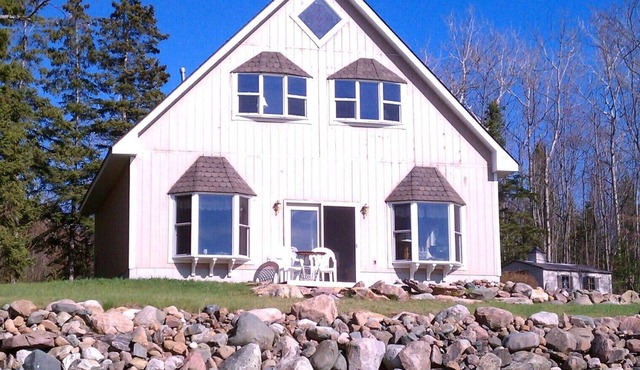 Beautiful waterfront cottage with perfect views of sunsets and freighters