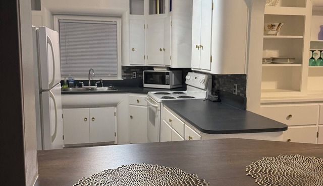 Beautifully restored, fully furnished 3 bedroom home one block from downtown