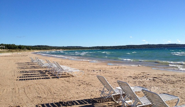 Charming Harbor Springs cottage right on the sandy beach and crystal water