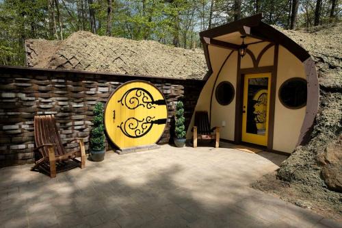 Charming Luxury Hobbit House with Private Hot Tub in Tranquil Woodlands on Littlefield Pond in Springvale, Maine
