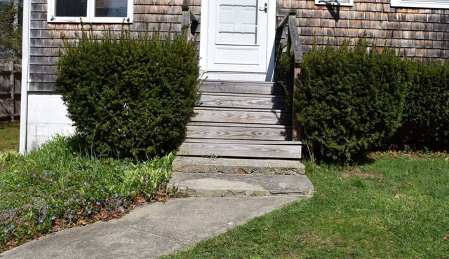 Condo in Falmouth with access to the secluded flax pond and a built in pool.