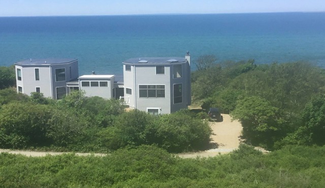 Contemporary beach house on dune directly on Cape Cod Bay