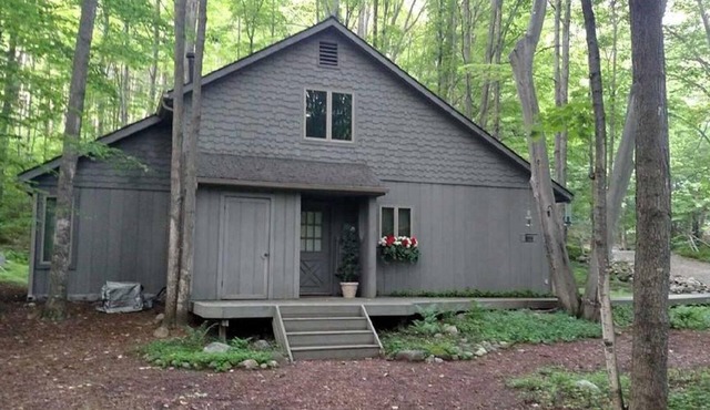 Cottage In Schuss Village on Two Acres nestled in a wooded setting