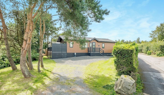 Country and modern cladded lodge.