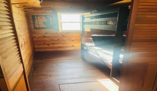 Cozy 2-bedroom cabin in Grayling with Ausable Holy Waters at the road end.