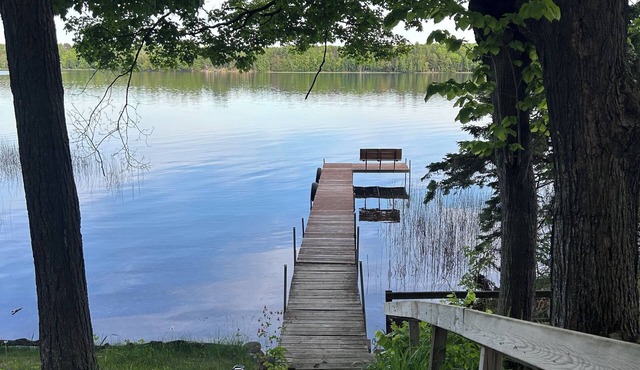 Cozy 2-bedroom cabin on beautiful Connor’s Lake w/AC and WiFi, UTV trails near
