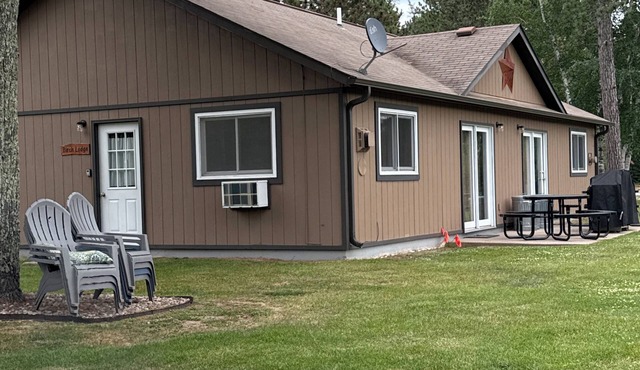 Cozy 2-bedroom cabin in tranquil Side Lake. On the water, dock space available.