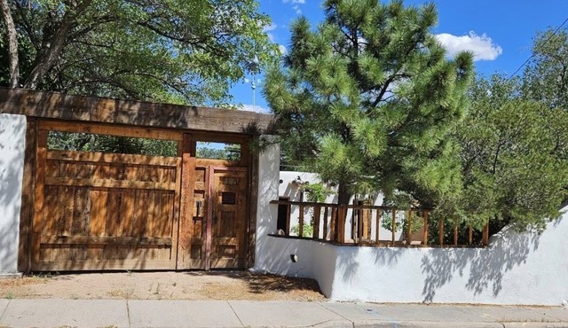Cozy Adobe centrally located with covered parking.