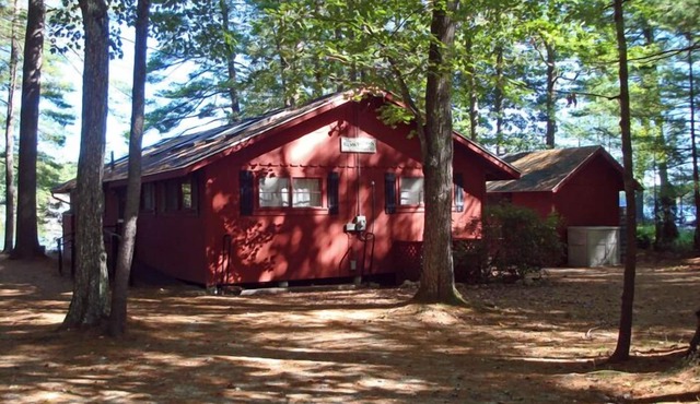 Cozy camp with large sandy beach and excellent views of Little Sebago.