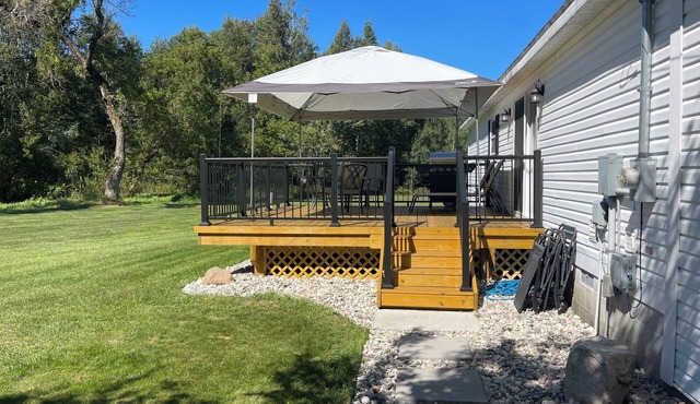 Cozy country home, “Sunny Meadows” in Cadillac on 40 Acres! Pet Friendly.