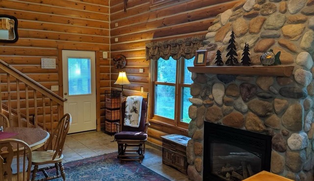 Cozy lake cabin in Crosslake with a fireplace, perfect for relaxing getaways.