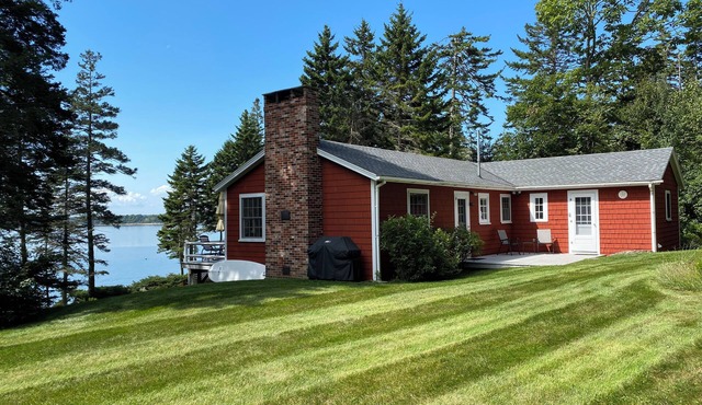 Cozy waterfront cottage overlooking Muscongus Bay with stunning sunset views.