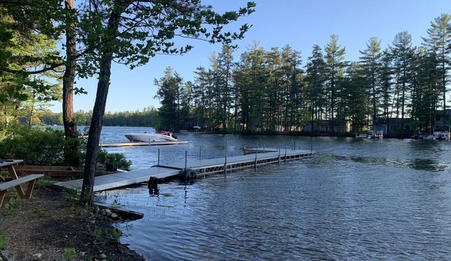 Cozy year round cottage on Square Pond with gradual sandy beach.
