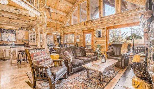 Delightful Riverfront Cabin with Wood-Burning Fireplace and Gas Grill & Hot Tub