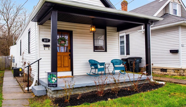 Dog-friendly 1920s charmer with bohemian finishes, firepit, central air, and W/D