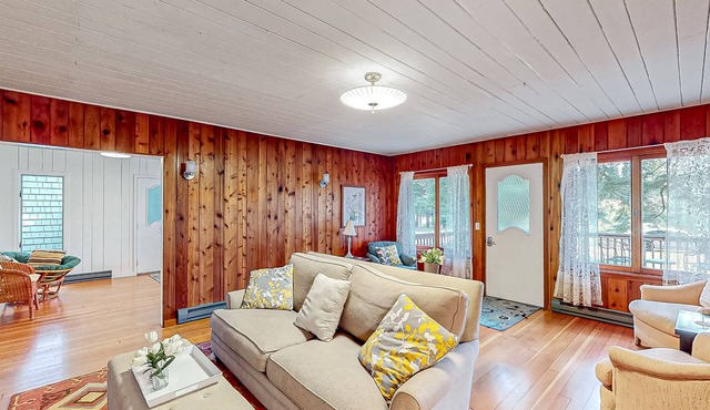 Dog-friendly downtown Glen Arbor home with deck, gas grill, and washer/dryer