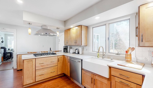Dog-friendly house with Bay views, charming interior, & deck - snowbirds welcome