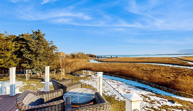 Dog-friendly waterfront home with hot tub, kayaks/bikes/SUPs, deck, & firepit