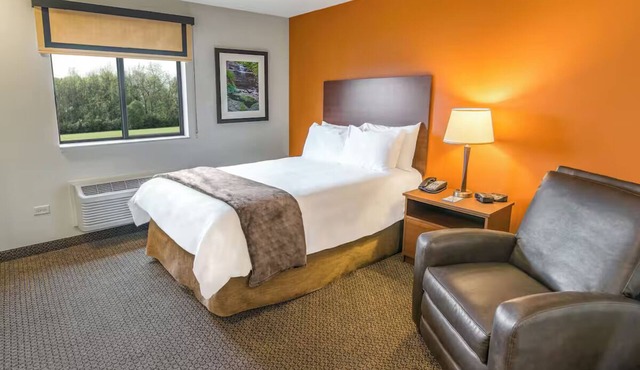 Double Your Stay Fun – 2 Queen Bed + Recliner Suites Near Alerus, UND & Shops