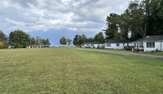 Entire property - 5 Cabins, clubhouse, pool, hot tub 340ft on Lake Huron