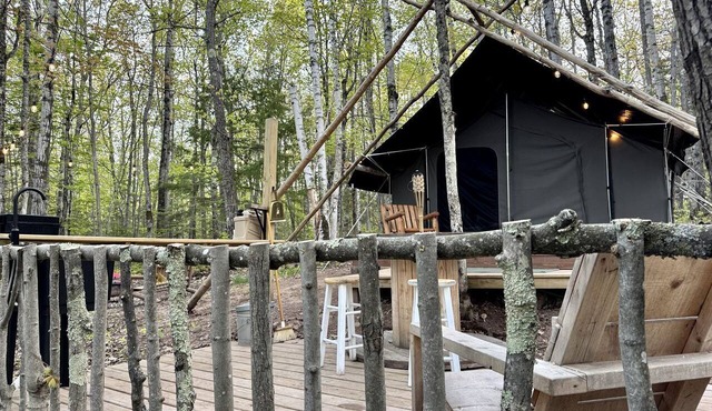 Escape and Unwind in this Creek-Side Charming Canvas Tent in Bayfield, Wisconsin